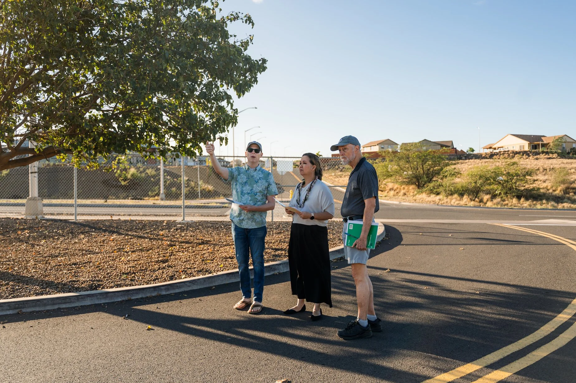   Photo Credit: Wildfire Safety Advocates / Aislinn Chalker     Wildfire Safety Advocates briefing Congresswoman Tokuda on evacuation challenges facing Waikōloa Village, including reliance on a single arterial road during wildfire emergencies.  