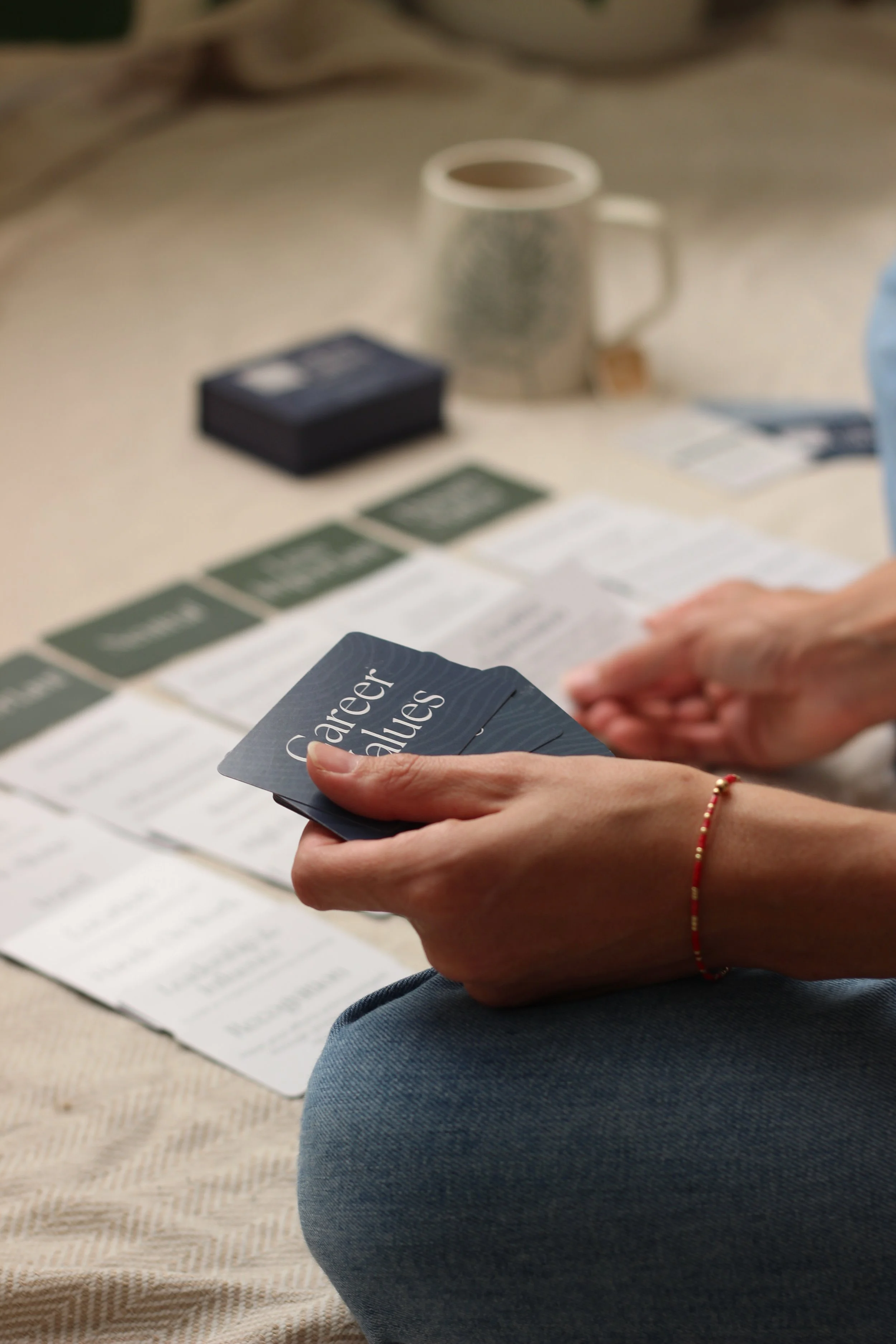Woman sorting Career Values  Cards