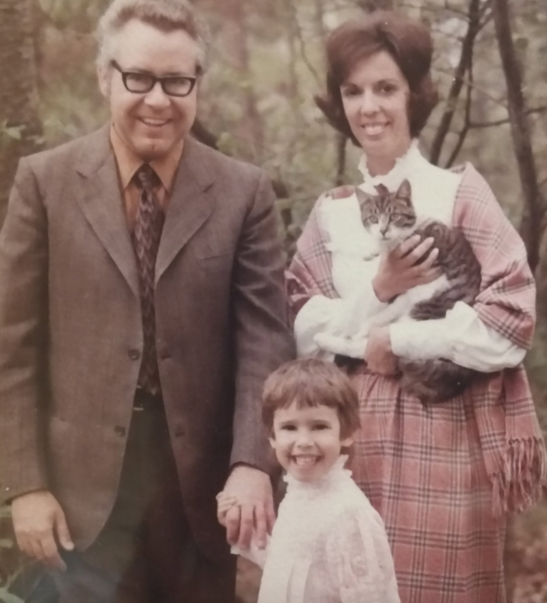 Young Amy with Mom and Dad and Cat