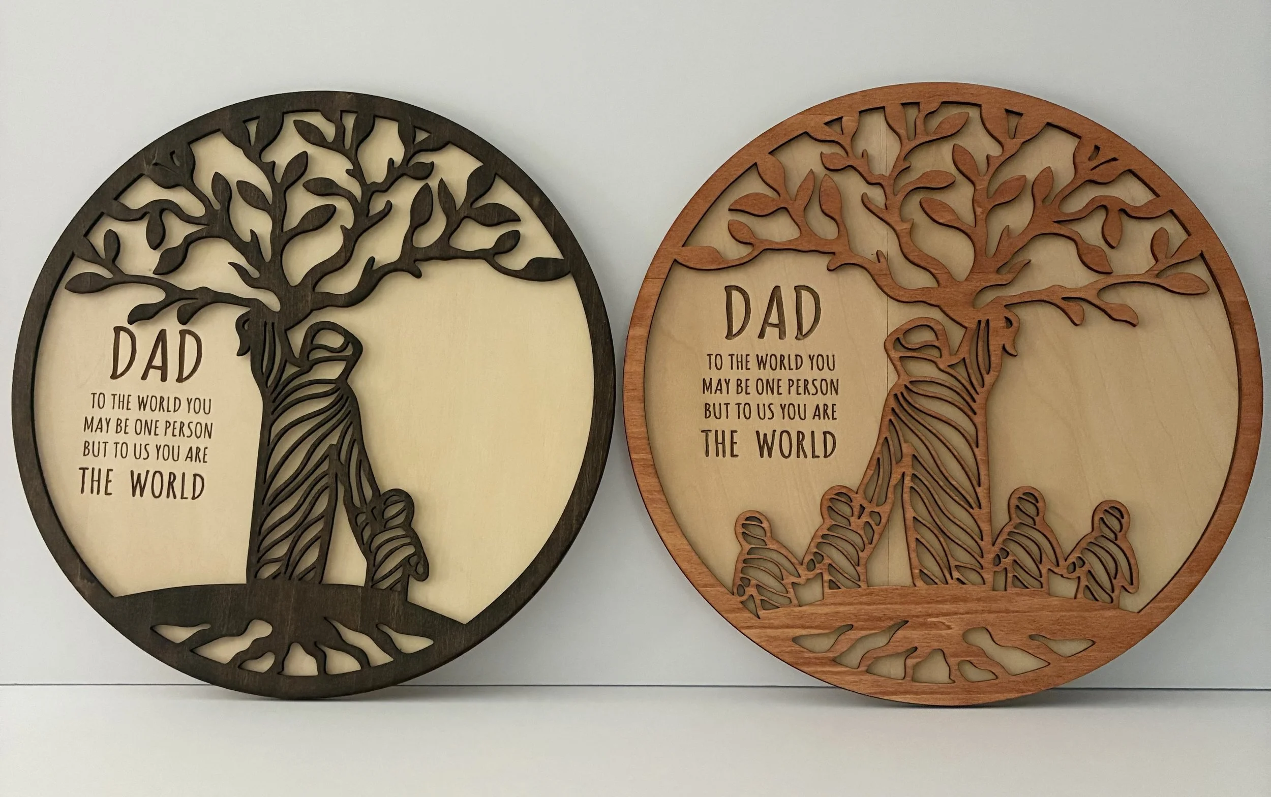 Decorative wooden plaques with a tree design and a heartfelt message for a father, featuring trees and social figures with an inspirational quote.