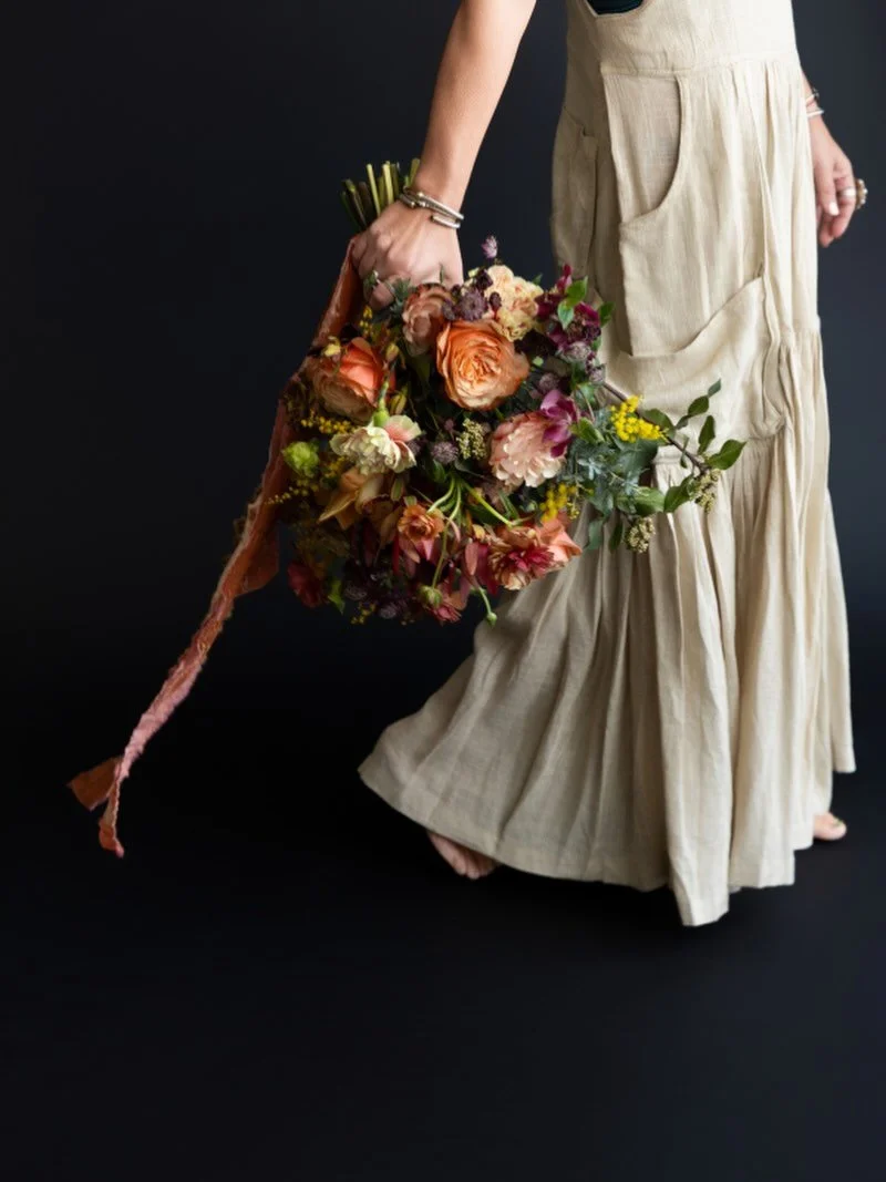 You may not remember my face.

But you will remember how the room felt.

I&rsquo;m Ash &mdash; floral designer, depth-chaser, believer that every gathering deserves a world built inside it.

Ash + Ether. Let me show you what I mean.

📸 @erinlcoxphot