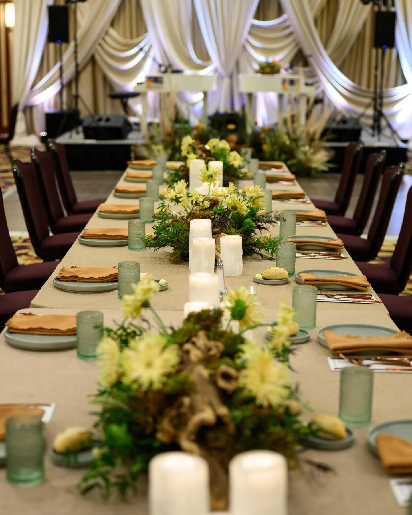 We closed the night at St. Julien - dinner, dueling pianos, dancing.

Grapevine roots across the tables. Pasta gerberas pushing through like they belonged there all along. Selenite towers instead of candlelight.

That&rsquo;s Boulder. Wild and organi