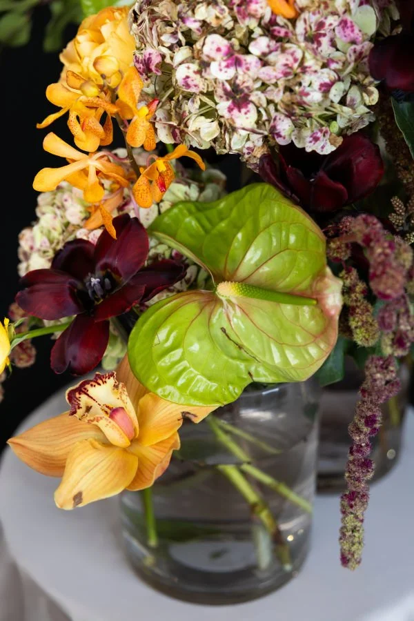 A small vase holding a bouquet of flowers
