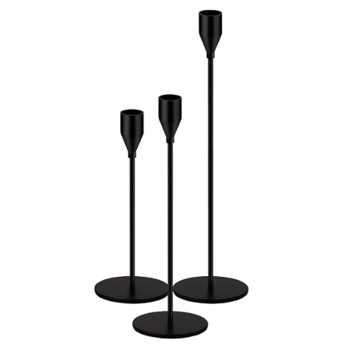 Set of three matte black metal taper candle holders in staggered heights — modern accents for tables or altars, part of Collected Pieces rentals.