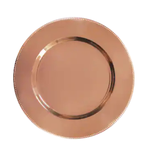 Copper charger plate with a polished metallic finish — available for rent through Collected Pieces tabletop collection.