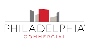 Philadelphia Commercial logo featuring a red and gray stylized cityscape.