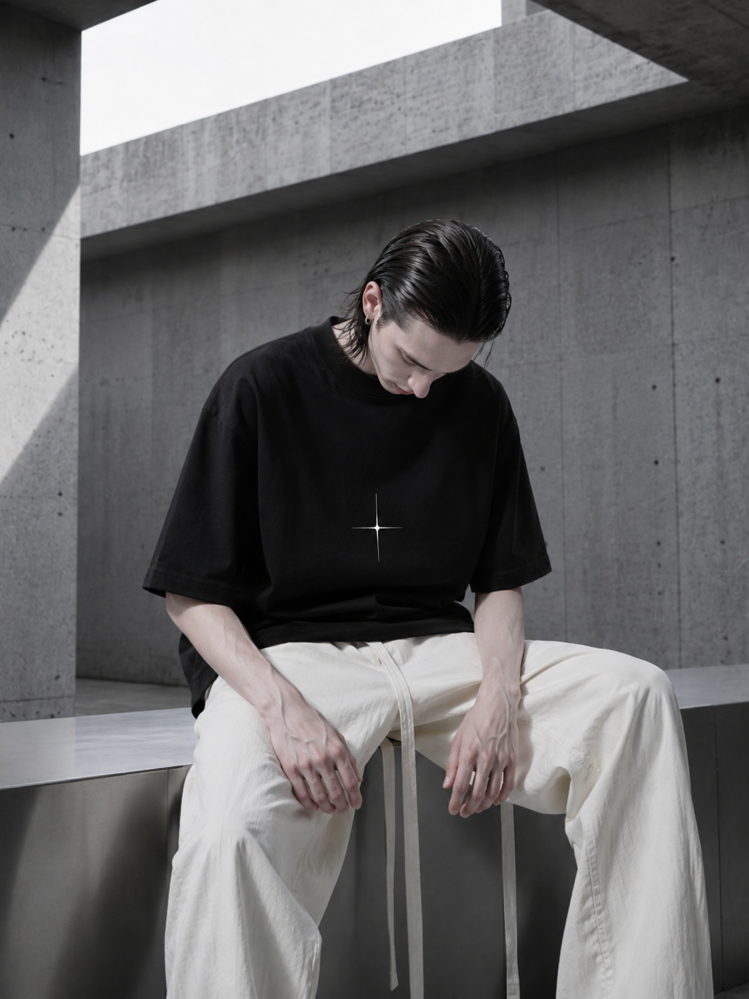 MODEL WEARING T SHIRT TECHNO STUDIOS SYMBOL 