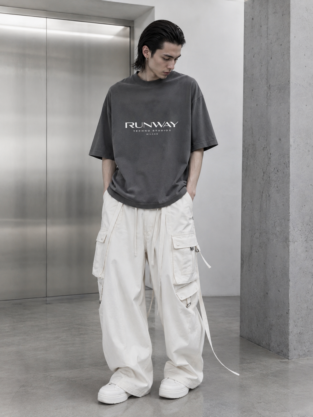 MODEL WEARING T SHIRT TECHNO STUDIOS RUNWAY