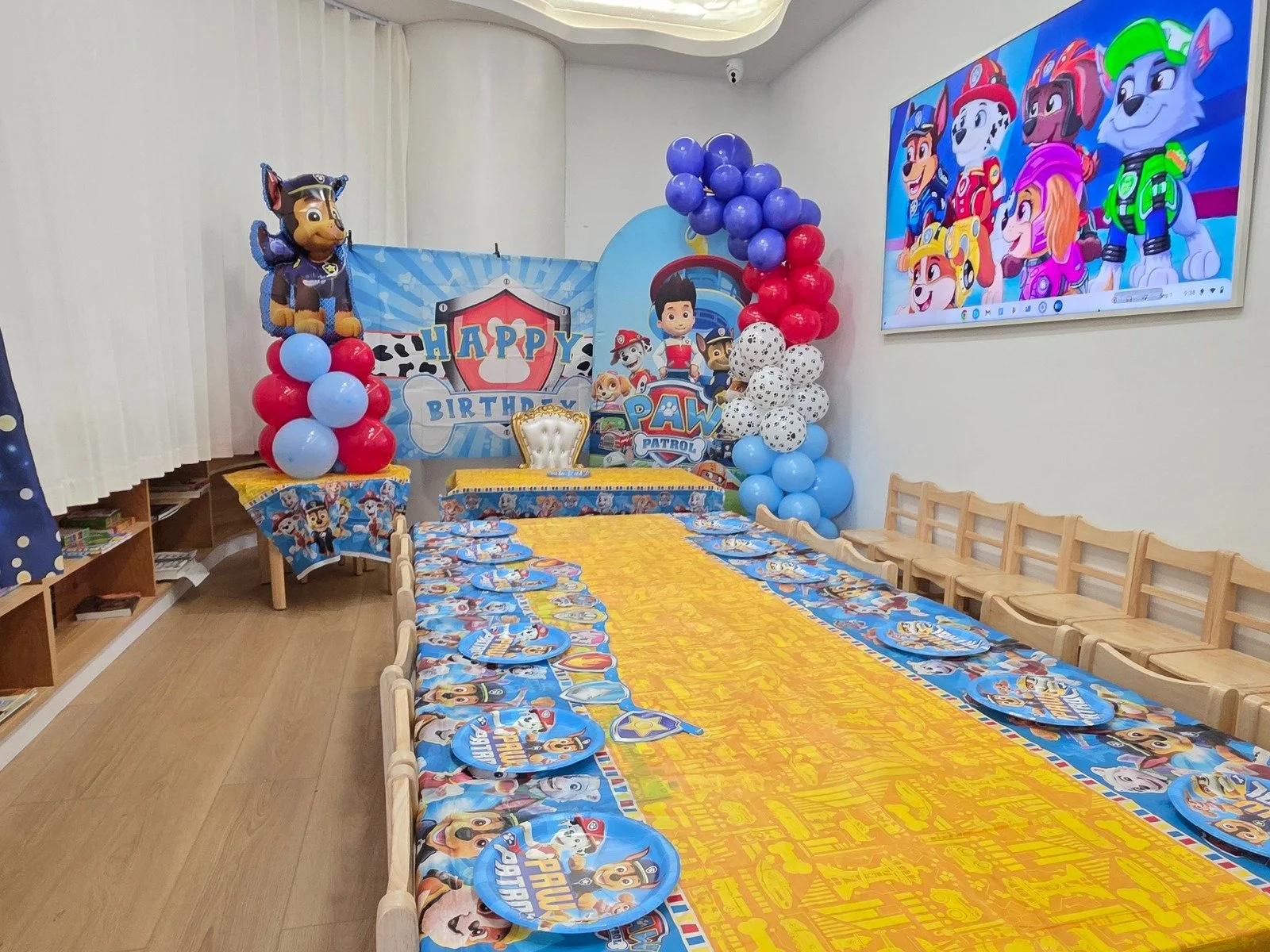 happy space playground - birthday parties - paw patrol theme - indoor playground - party decorations - paw patrol theme birthday party - paw patrol birthday backdrop - balloon garland - indoor playground birthday party