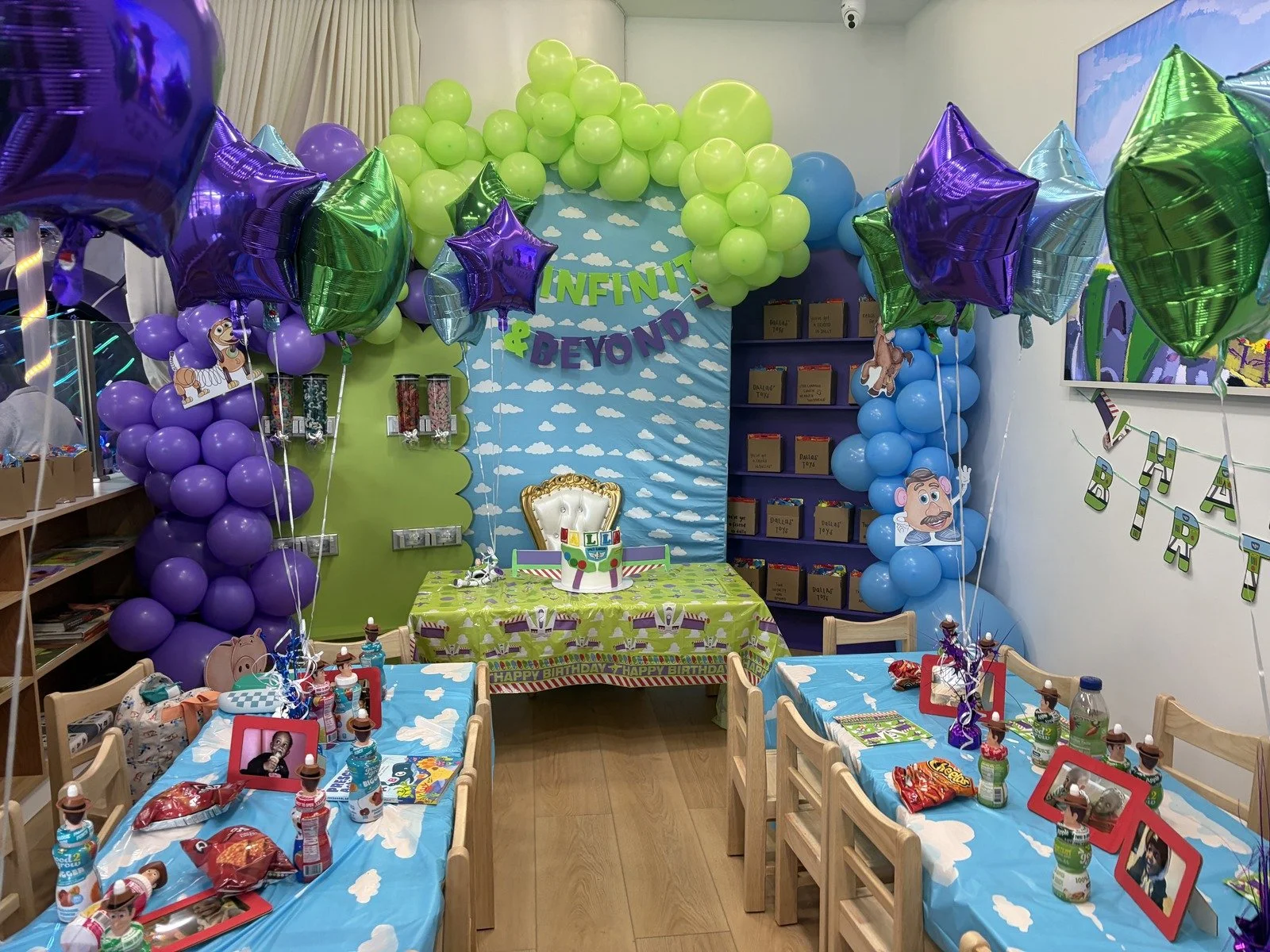 happy space playground - birthday parties - toystorytheme - indoor playground - party decorations - toystory theme birthday party - toystory birthday backdrop - balloon garland -twoinfinityandbeyond- indoor playground birthday party