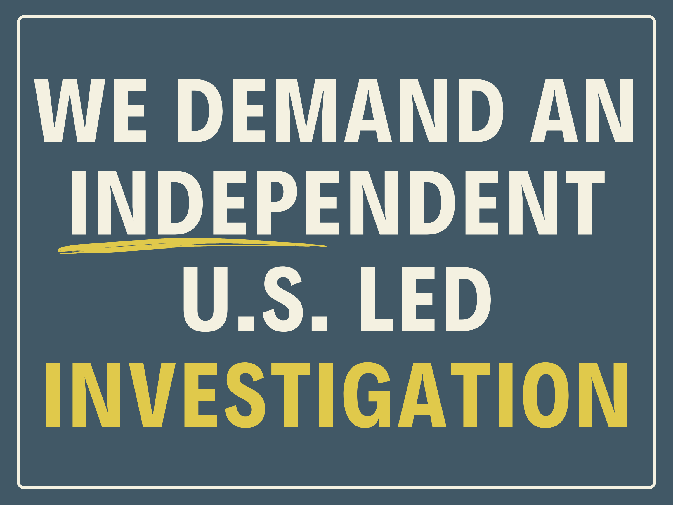 Sign stating 'We demand an independent U.S. led investigation' with a dark background and yellow highlight on 'investigation'.
