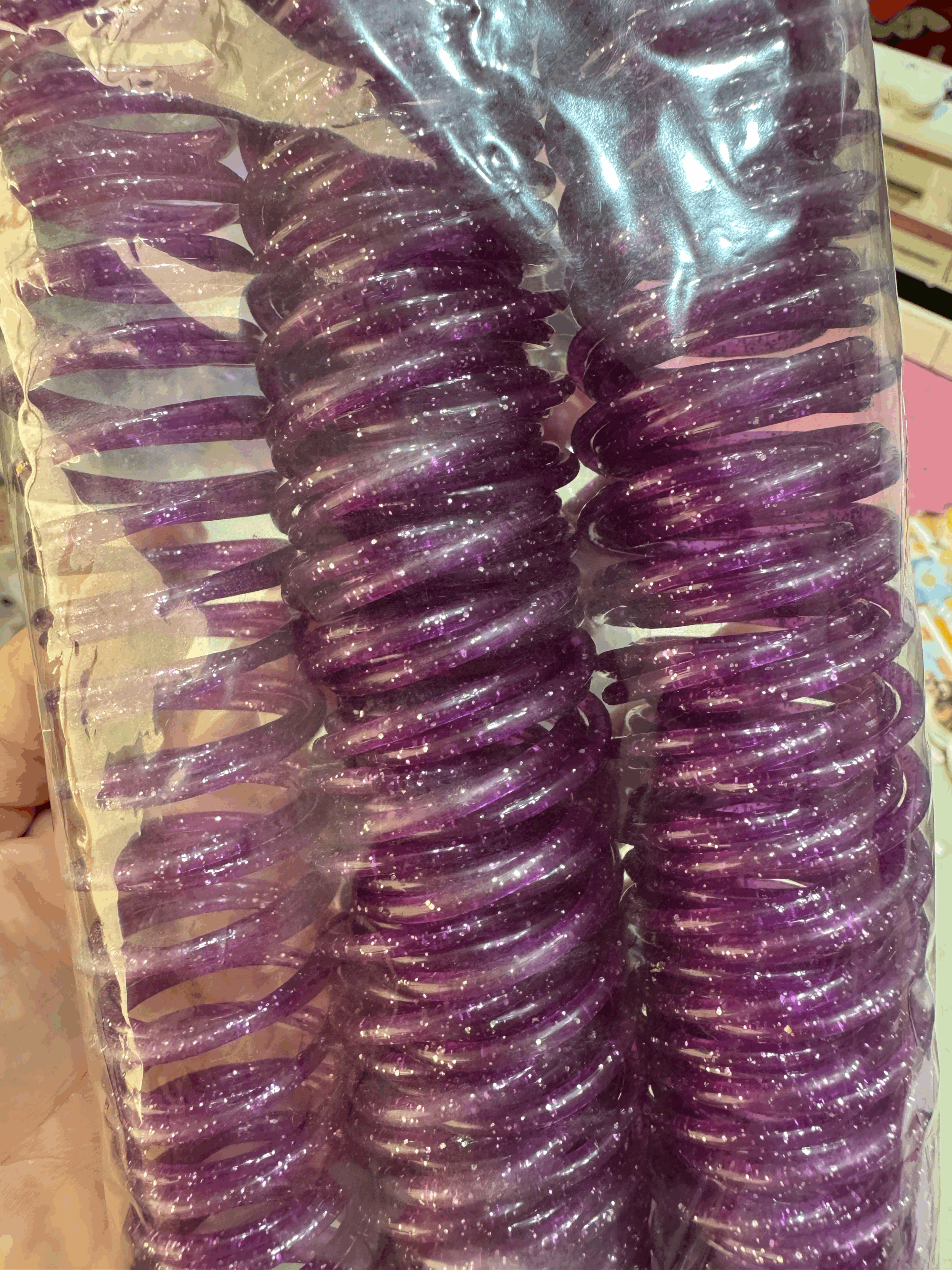 ESPIRAL MORADO GLITTER 2.5 CM 16 PZAS