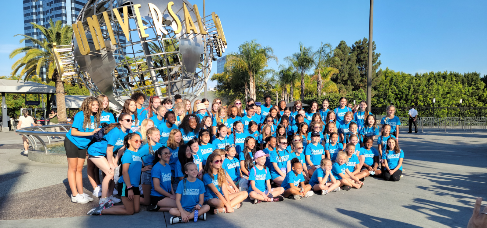 Dance students from Hollywood Dance Experience posing for group photo at Universal Studios during day two summer intensive experience