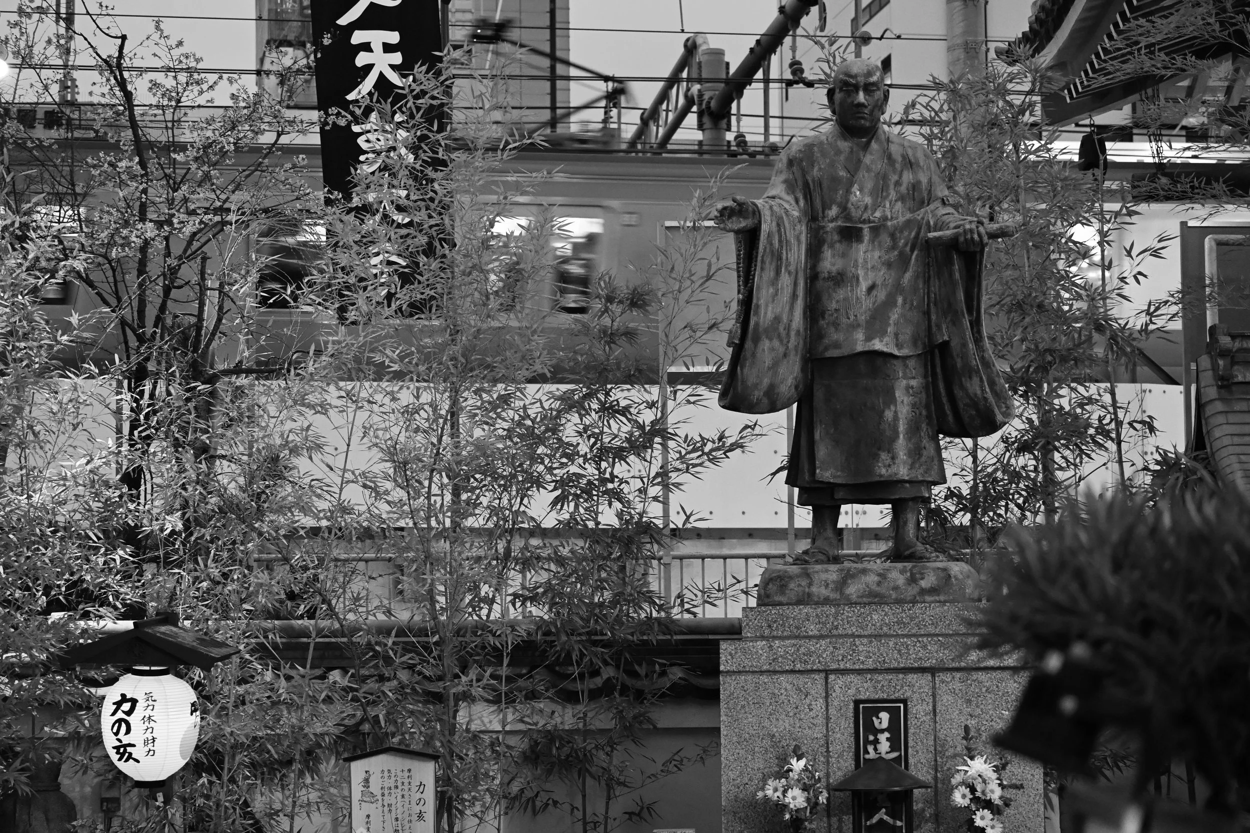 passing train shrine above Amoyoko market Tokyo. History meets modern. March 2026