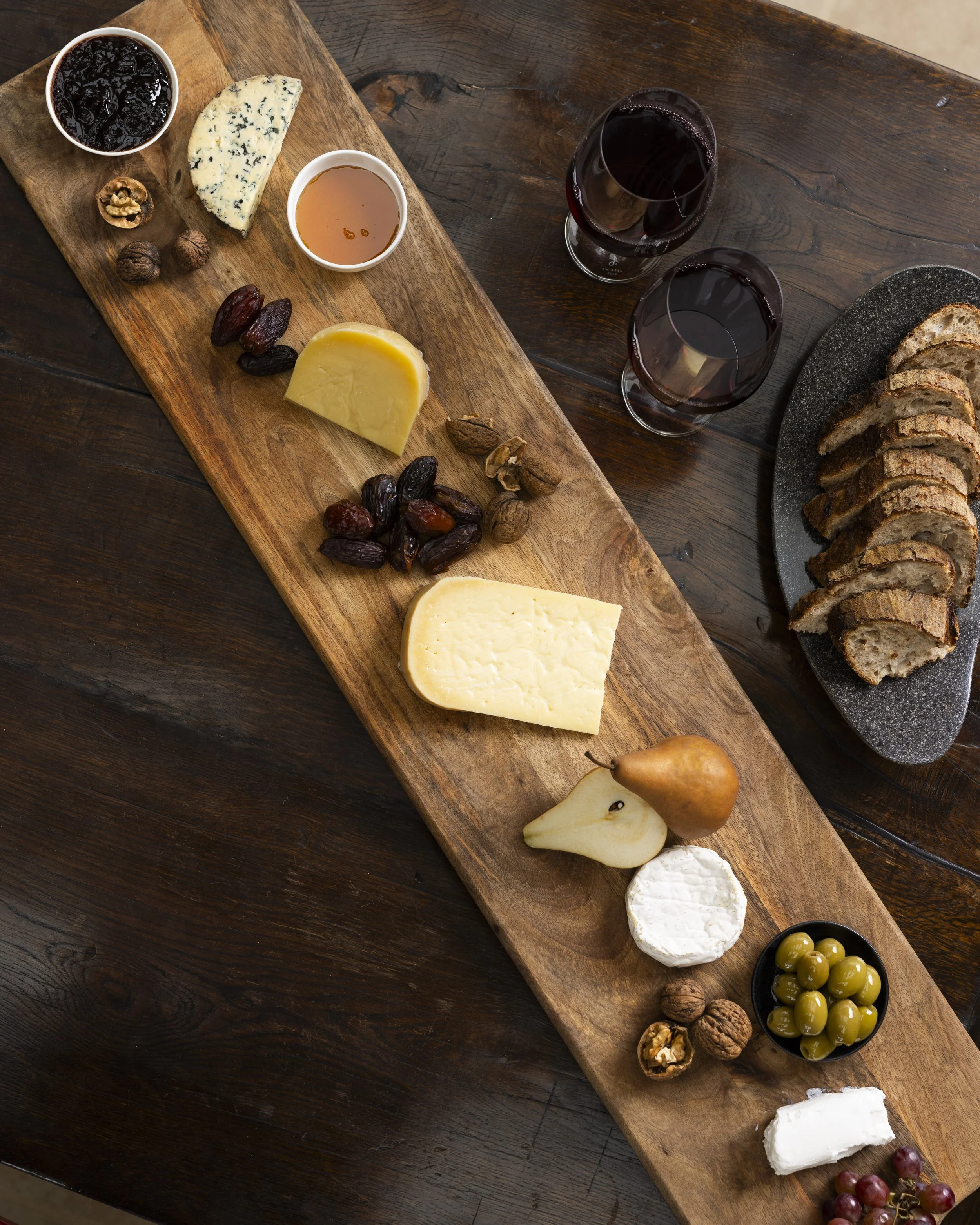 Arrival welcome platter for guest - featuring cheese fruits condiments and artisan