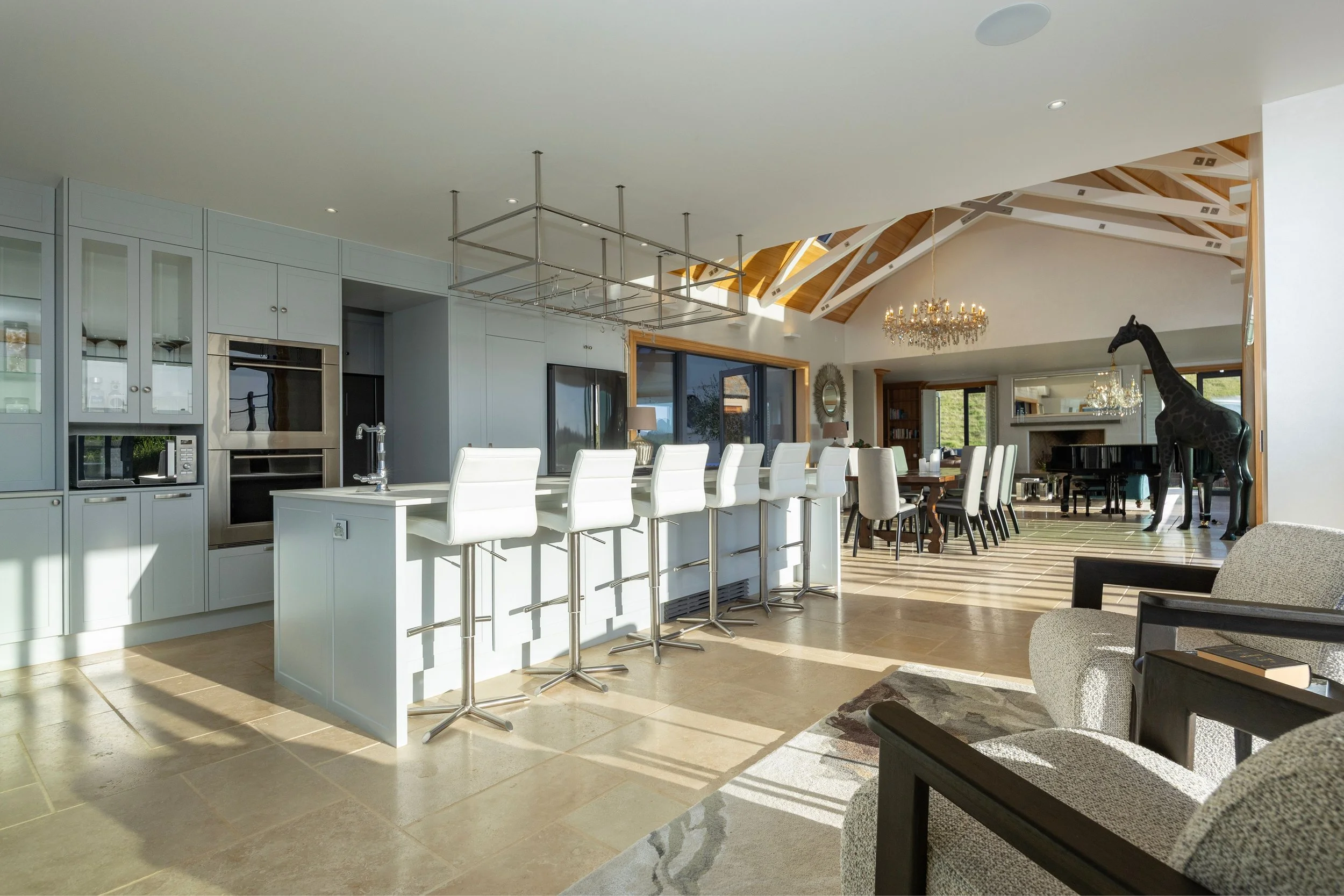 Kitchen and dining area at Opito Point Lodge - Luxury Beach-side Accommodation in Coromandel, New Zealand