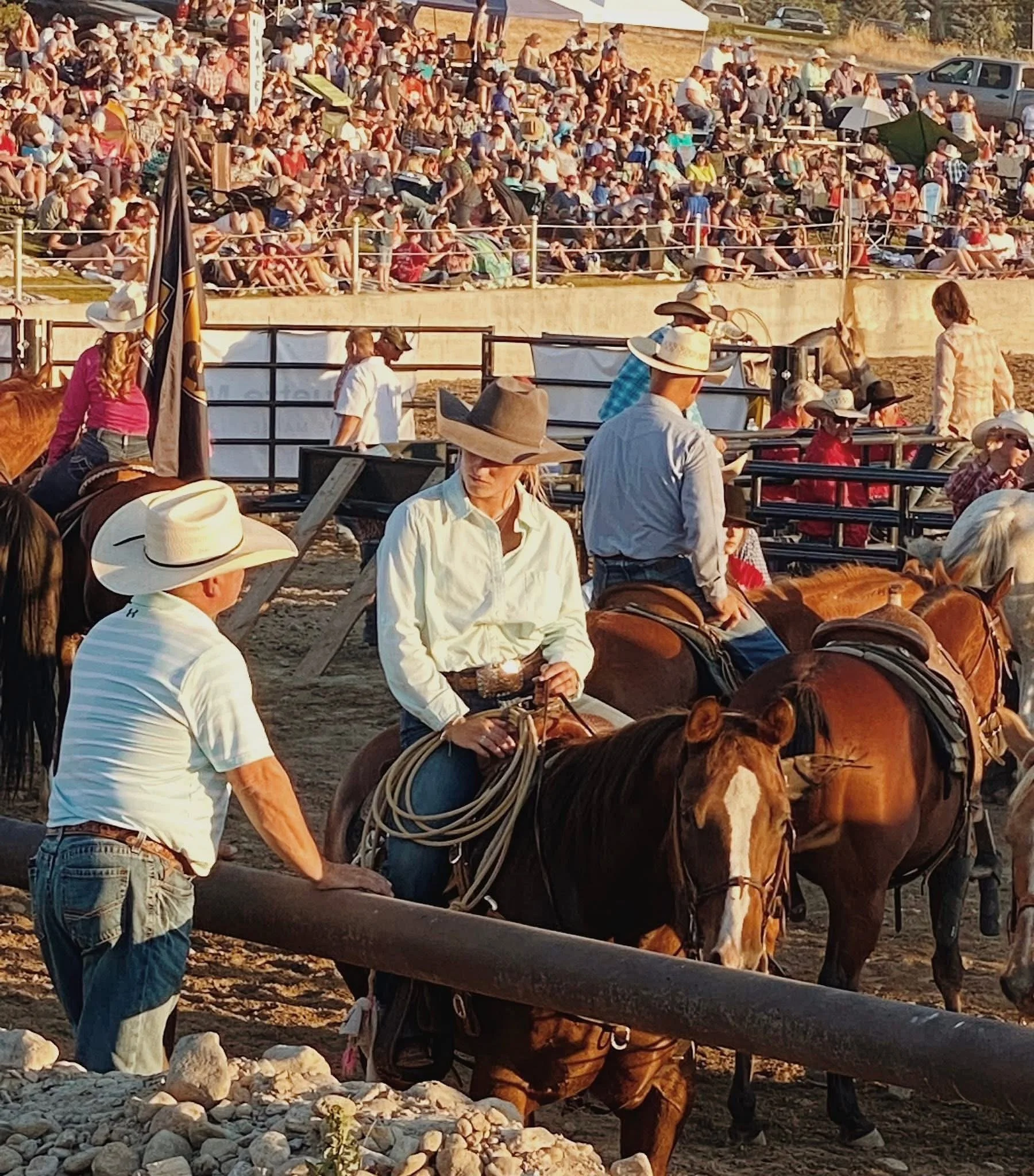 Aubree Skone receiving mentorship from Randy at the rodeo