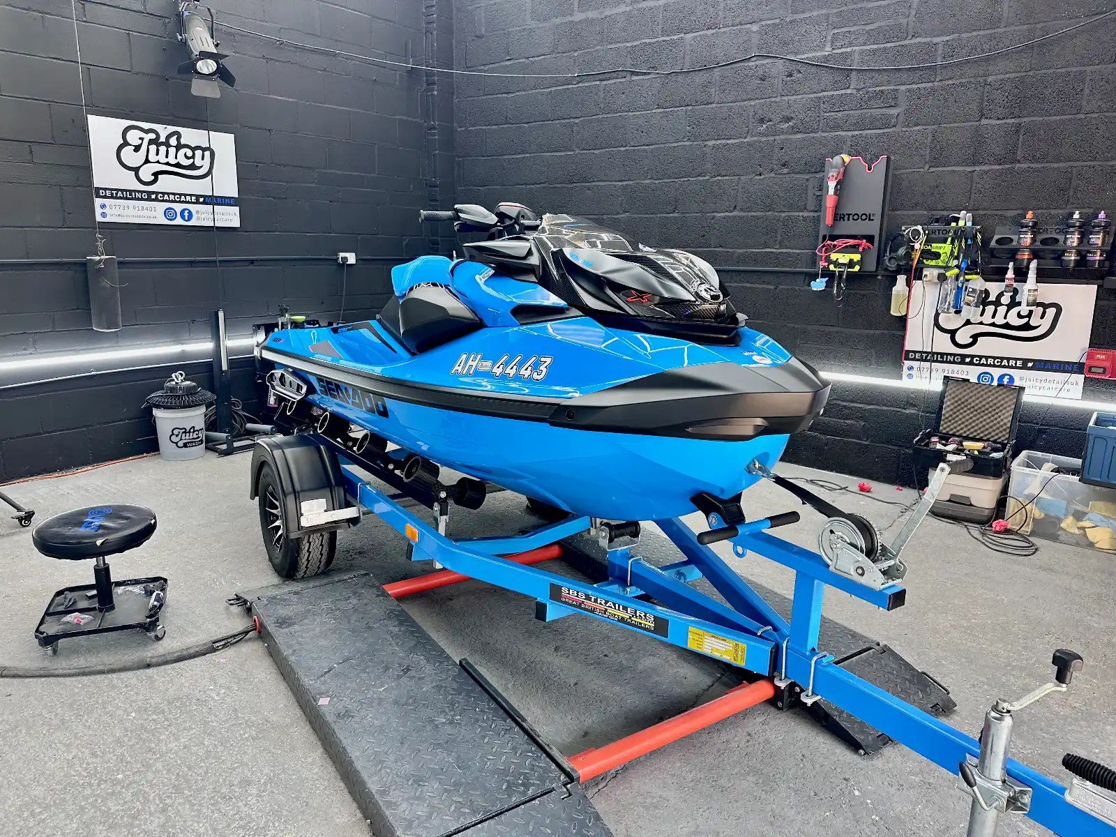 Jet ski ceramic coating applied indoors at Juicy Car Care's unit near Worthing