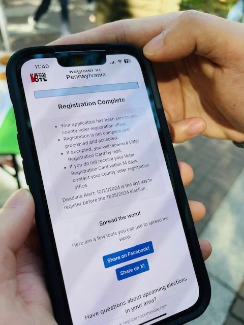 Mobile phone someone just completed their voter registration.
