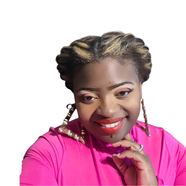 Close-up of Erica wearing bright pink top, smiling and touching her chin.