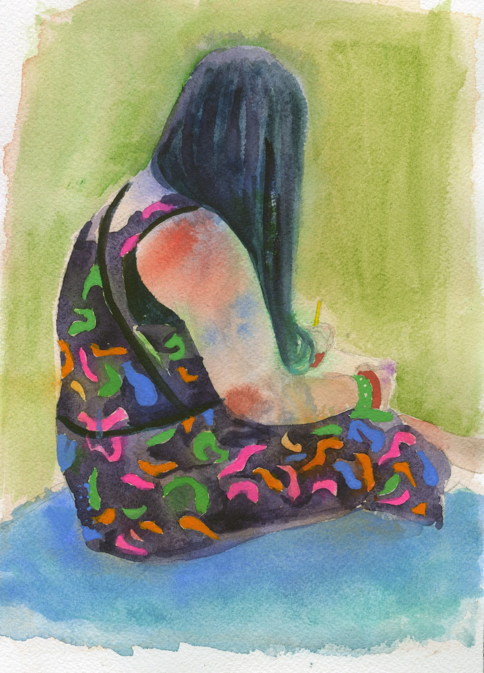 A woman with long dark hair sitting at a table, drawing on a sheet of paper. She is wearing a black sleeveless dress with colorful abstract patterns.