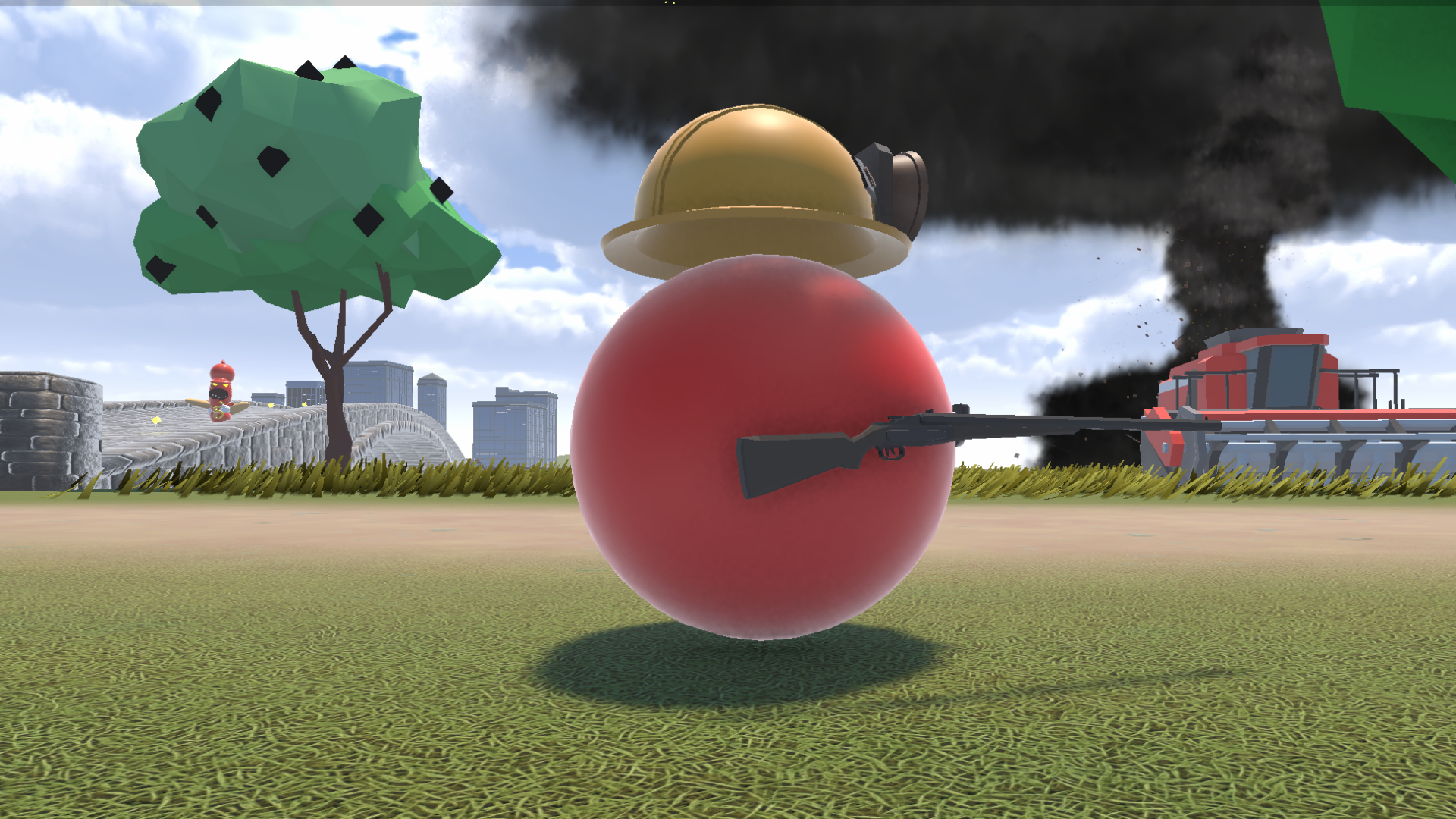 A video game scene featuring a red spherical character with a golden helmet, holding a rifle, in front of a tank with black smoke rising from it, in a cityscape background with cartoonish trees and buildings.