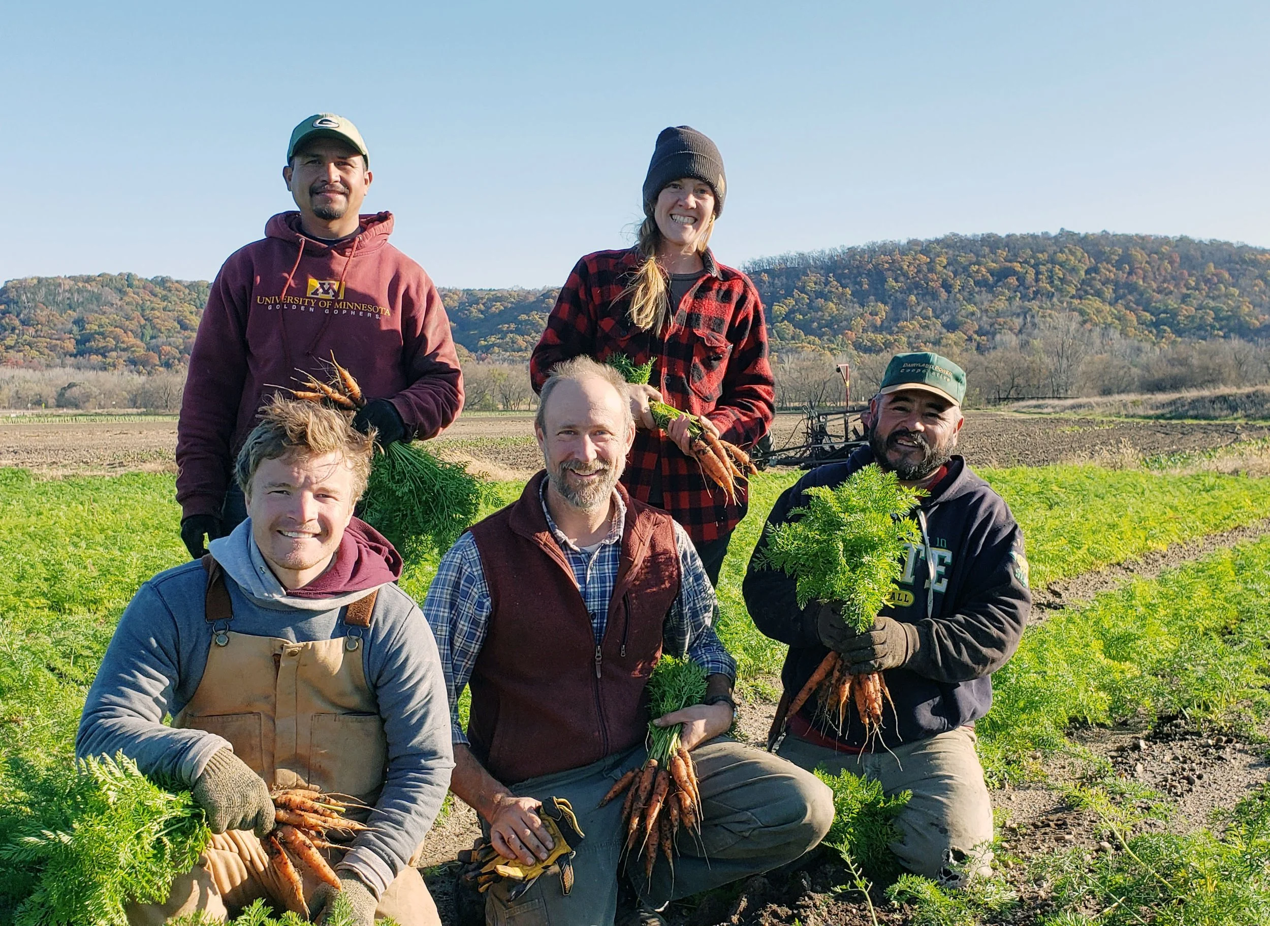 Jack (center) with members of the Featherstone team. 