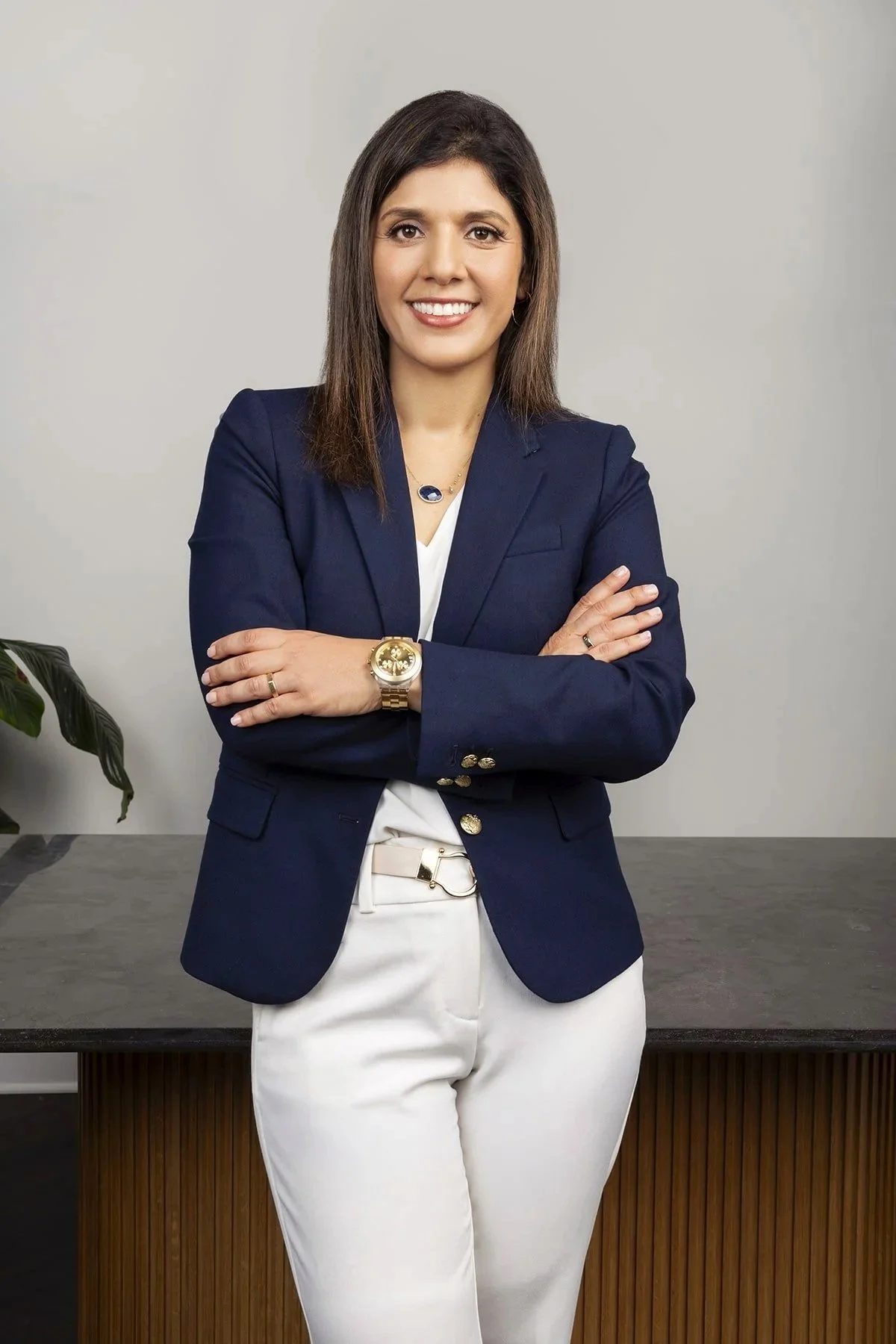 Dr. Mala Kaul portrait, standing in the front table with folded arms