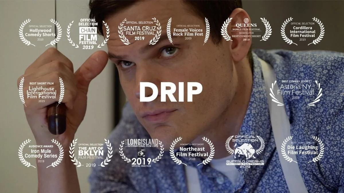 Close-up of a man with short hair and a blue patterned shirt, holding a cleaver, with various film festival laurels and awards overlayed, including nominations and wins from 2019. Film title: Drip.