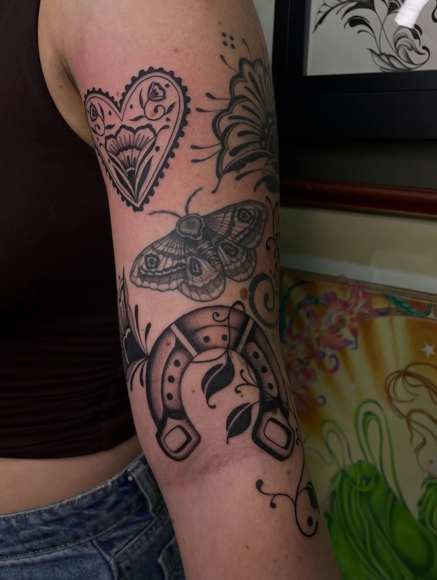 Horseshoe to cover a smol horseshoe and a heart with healed flower for Skye. Thank you 🖤🖤 DM to book in, done at @westside_tattoo_mermaid_beach