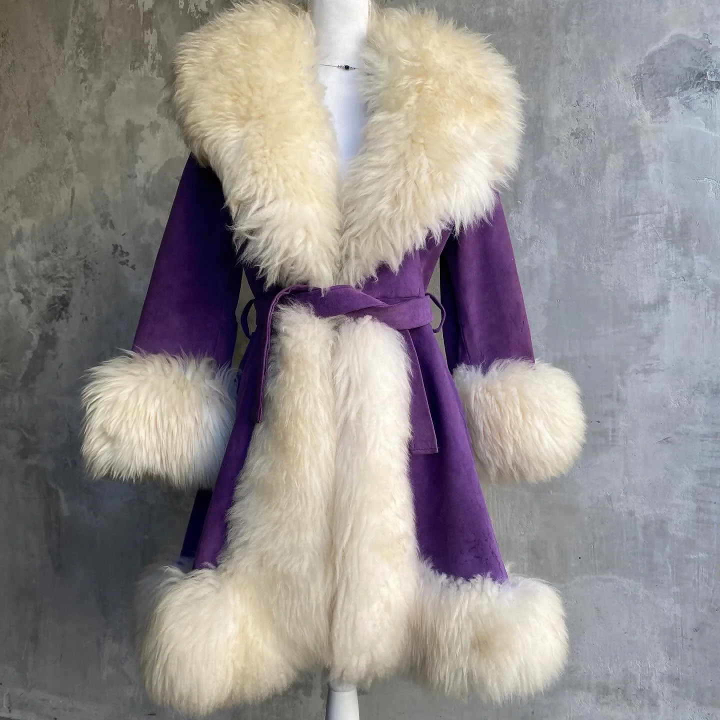 this beauty is officially available. extremely rare 1960s lilli ann pennylane coat. beyond stunning!! royal purple suede, matching satin lining, and lush fluffy shearling around the collar, sleeves, and hem. condition is fairly good for the age and m