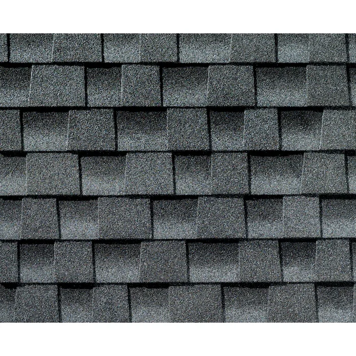 Close-up of dark gray asphalt shingles on a roof.