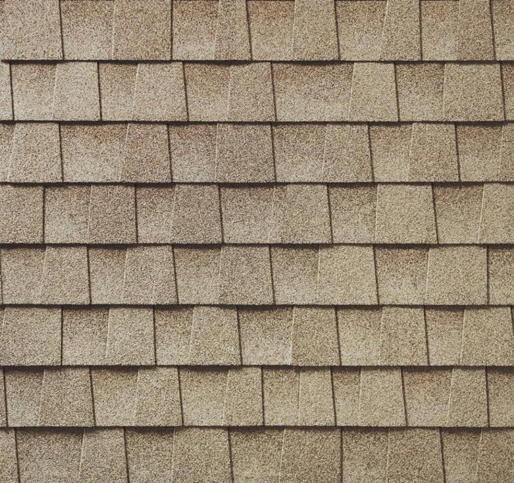 Close-up of a brown shingle exterior wall.