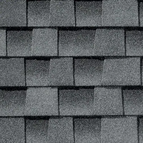 Close-up of gray asphalt shingles arranged in horizontal rows.