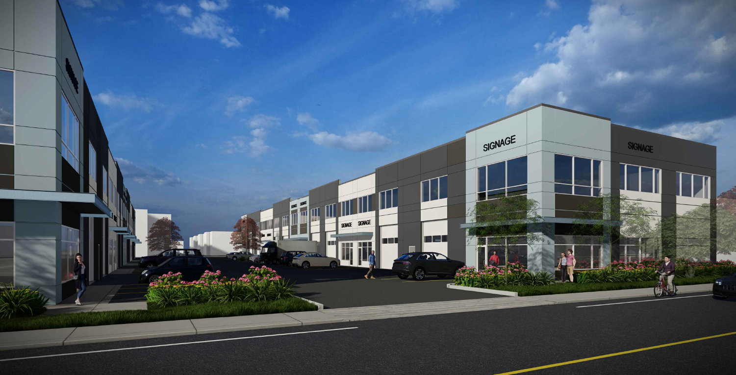 A modern commercial development with shops and parking lot, some people walking and biking outside, and a partly cloudy sky.