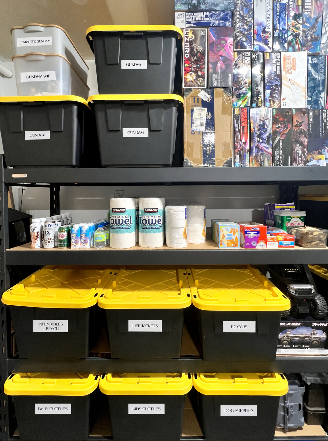 Organized garage shelving with labeled storage toes and clear zones