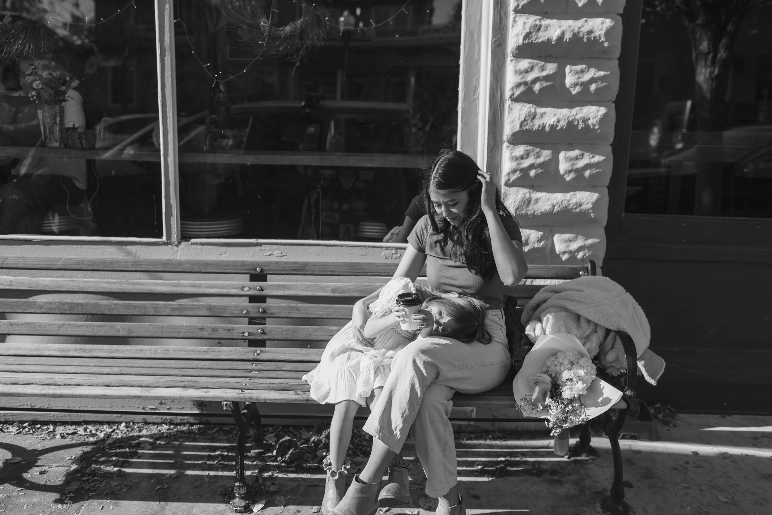 mother daughter candid photo on a north end bench in boise, Idaho