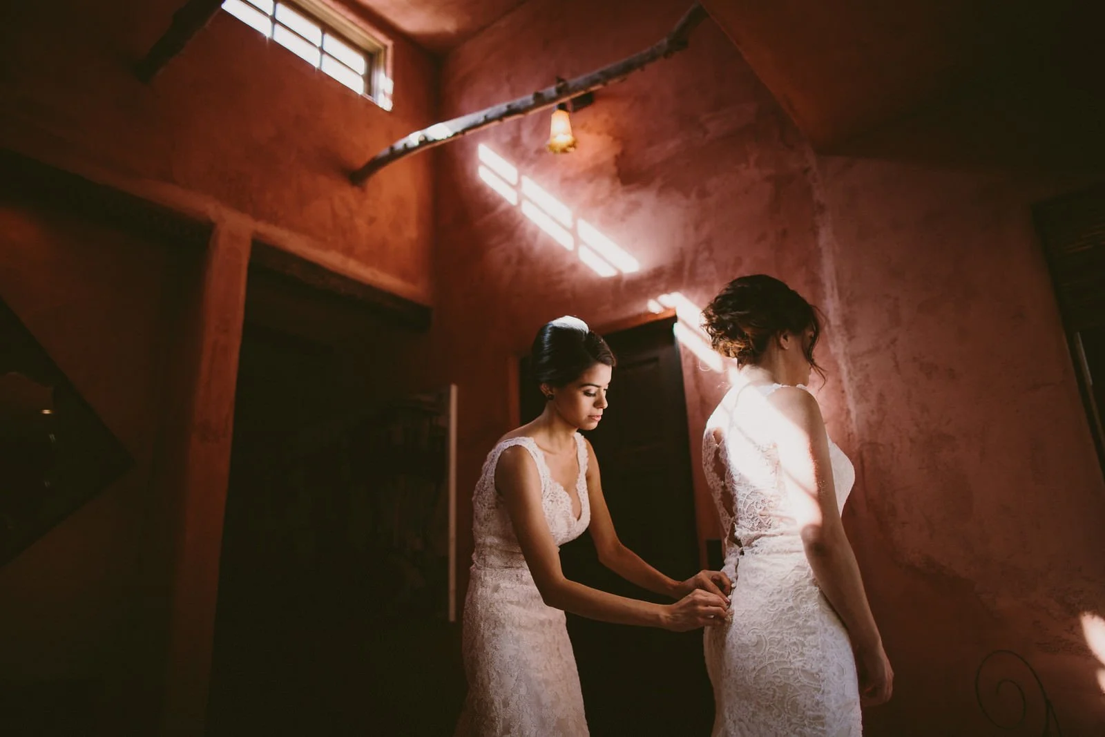 Two Brides get ready in their wedding dresses together- Sun Valley, Idaho Fine Art Wedding Photographer