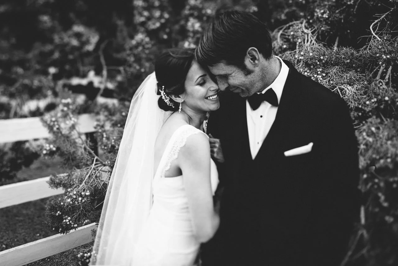 bride and groom candid smiles on their wedding day