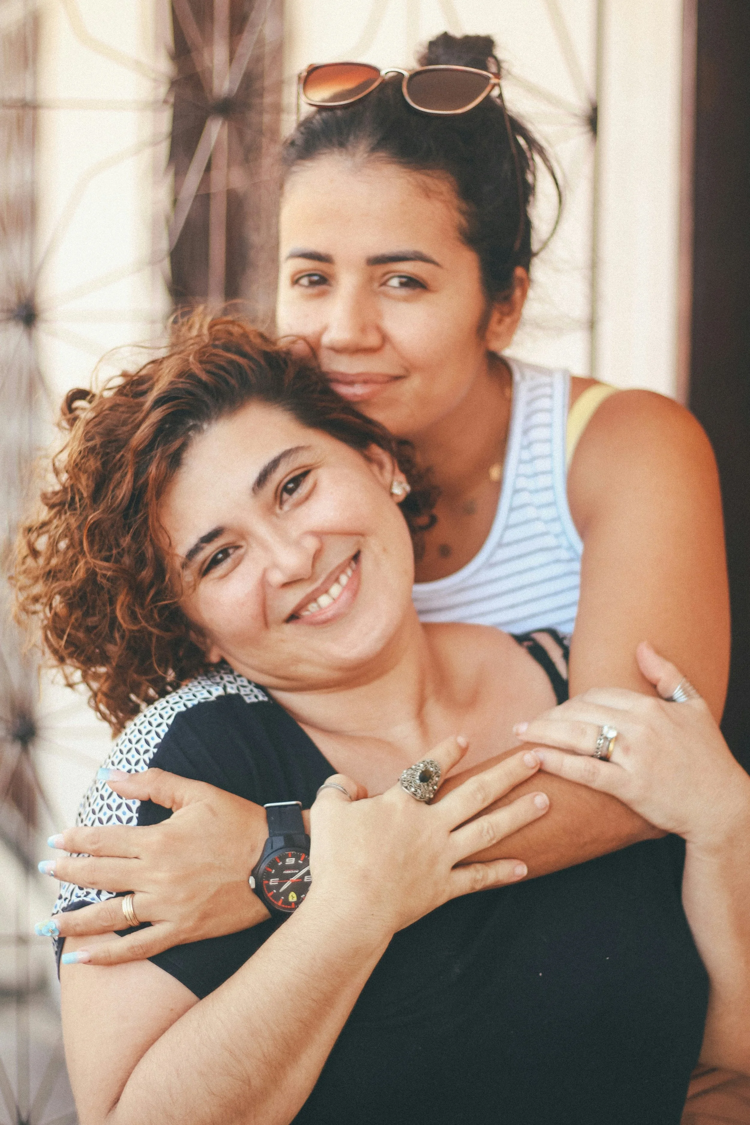 Two partners smiling and spending time together, representing connection, trust, and healthy relationships.