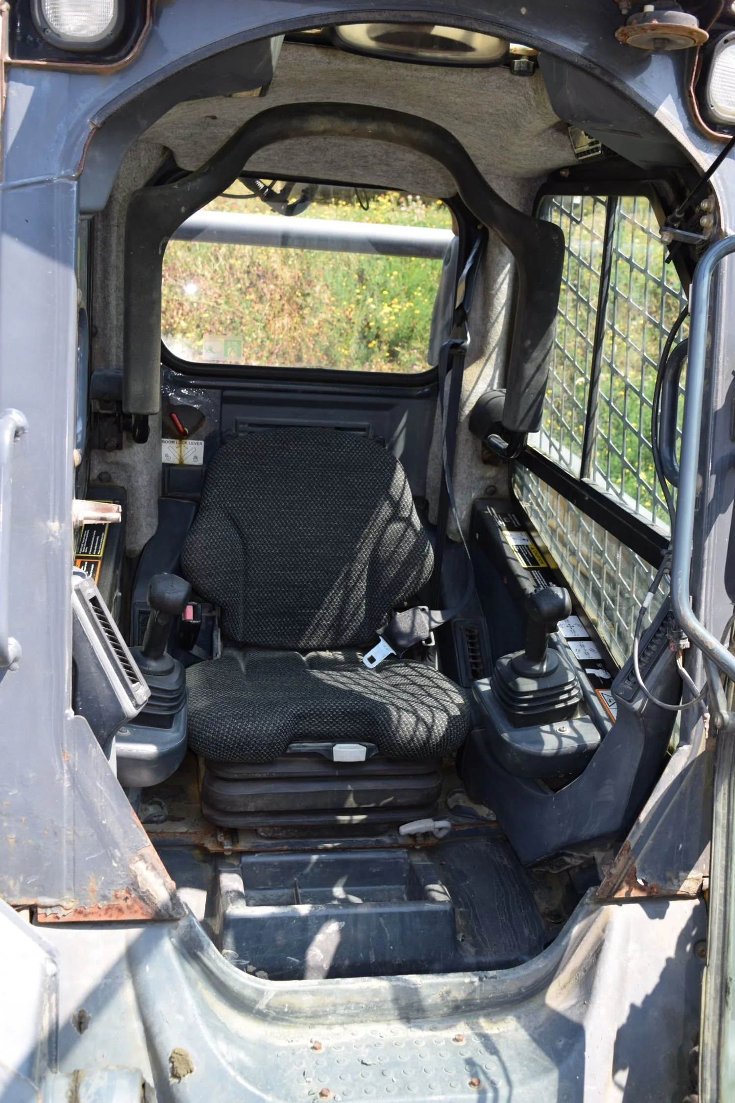 Cheval Noir  Equipment 2011 John Deere 323DT 8.JPG