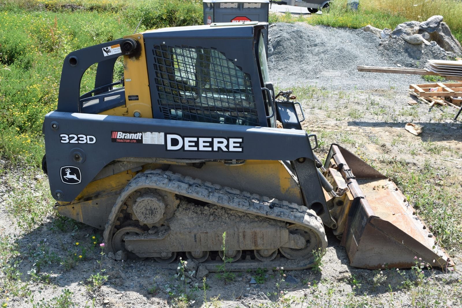 Cheval Noir  Equipment 2011 John Deere 323DT 4.JPG