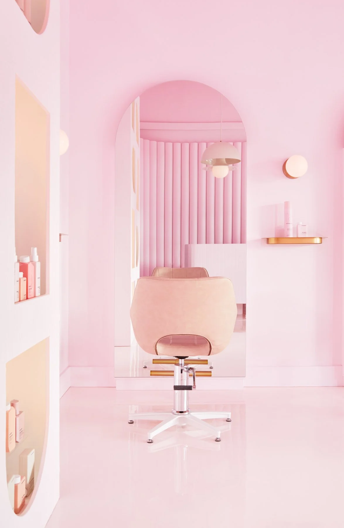 Pink Label hair salon hair chair with arched mirror.