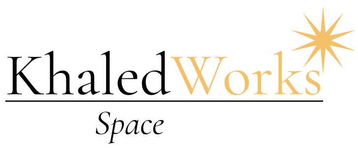 Logo for Khaled Works Space featuring black and gold text with a gold starburst design.