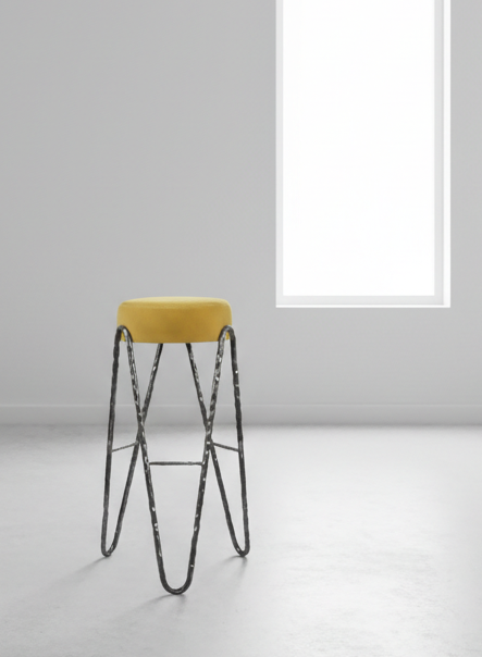 Aranea bar stool styled in a contemporary architectural setting. Sculptural forged steel base with upholstered cushion seat, ideal for modern luxury spaces.