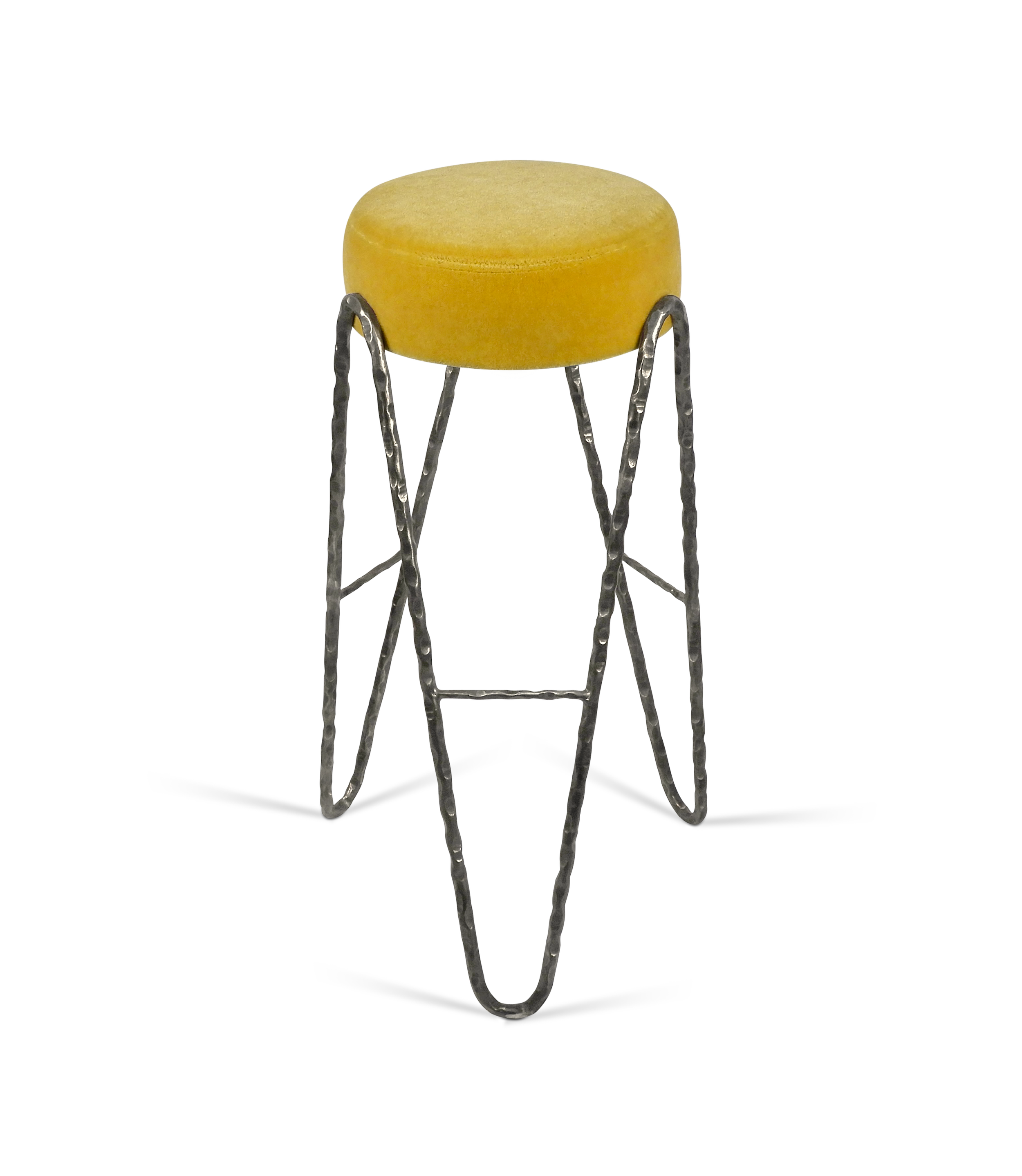 Aranea counter stool in hand-forged steel with upholstered seat. A minimalist metal seating design available in custom finishes and COM for interior design projects.