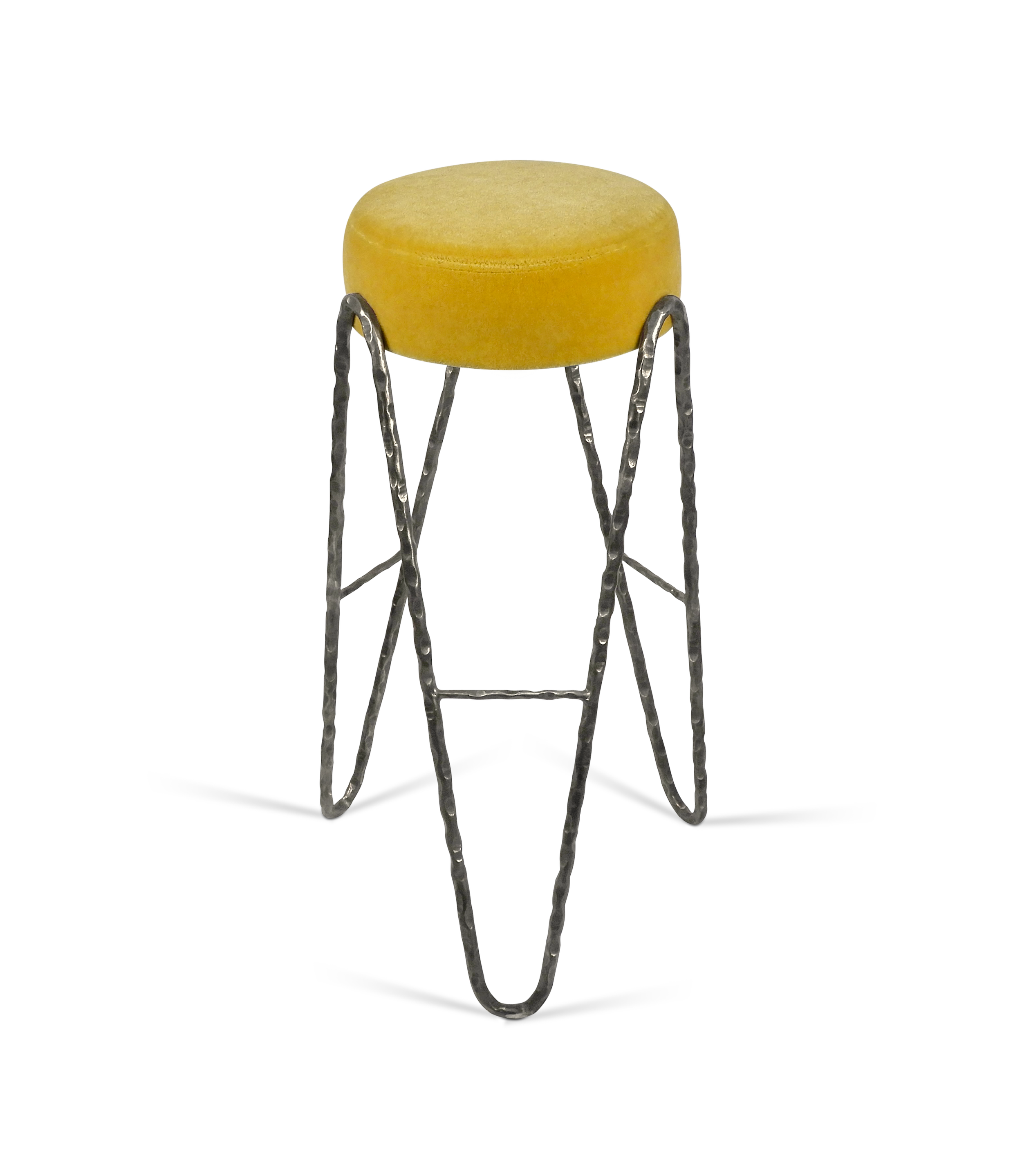 Aranea counter stool in hand-forged steel with upholstered seat. A minimalist metal seating design available in custom finishes and COM for interior design projects.
