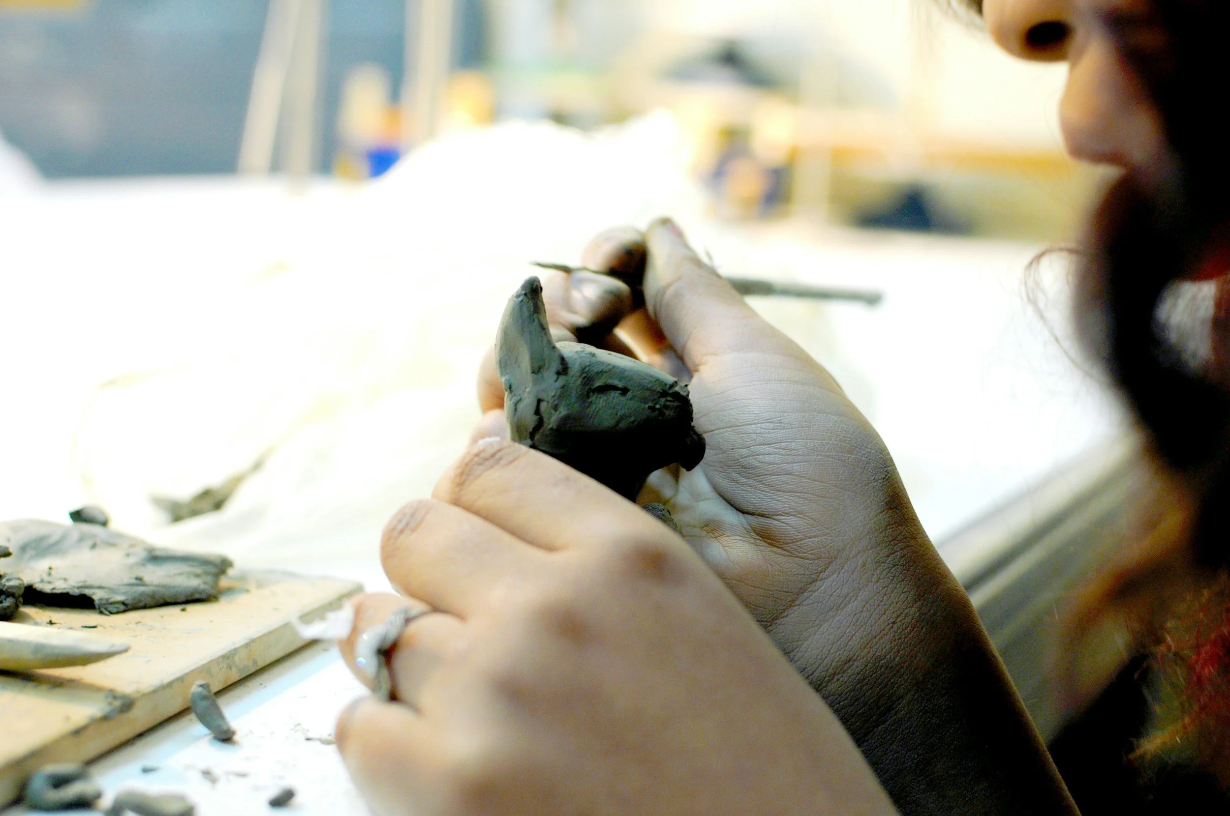A picture of someone scultpting