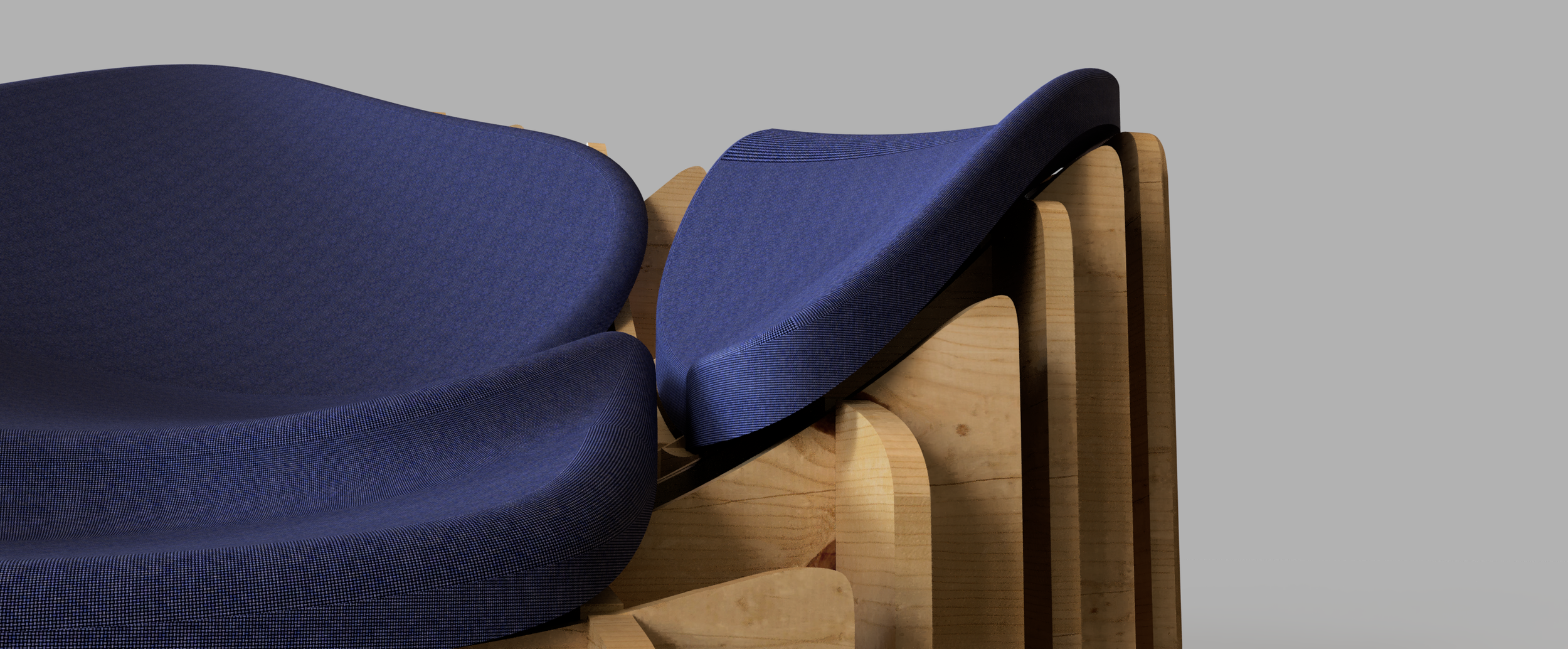 Close-up of a modern chair with blue fabric upholstery and a wooden frame, against a plain gray background.