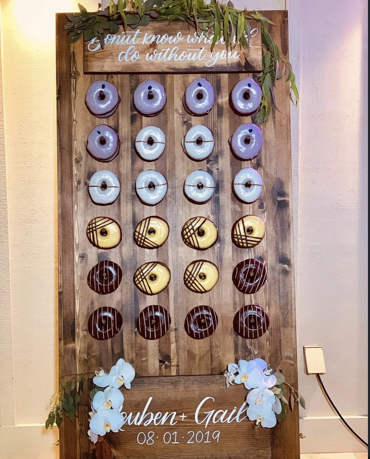 rustic-donut-wall-display-maui-wedding-reception-decor.jpeg